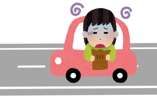 車に乗って気分が悪くなり、紙袋を持って吐きそうな表情をしている子どものイラスト。VR酔いの例えとして使用する画像。